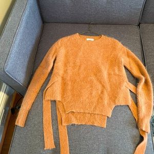 It’s super cute sweater